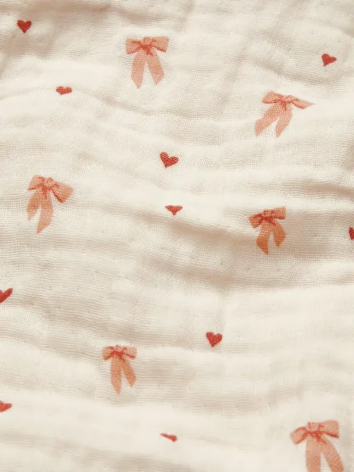 Babydekentje Bows van biokatoen