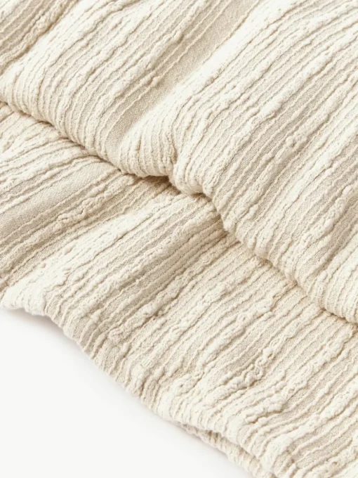 Bouclé bedsprei Thomassin