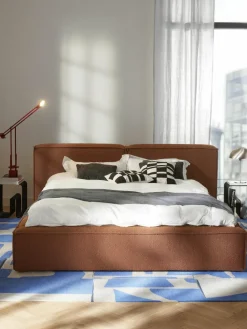 Bouclé gestoffeerd bed Lennon met opbergruimte