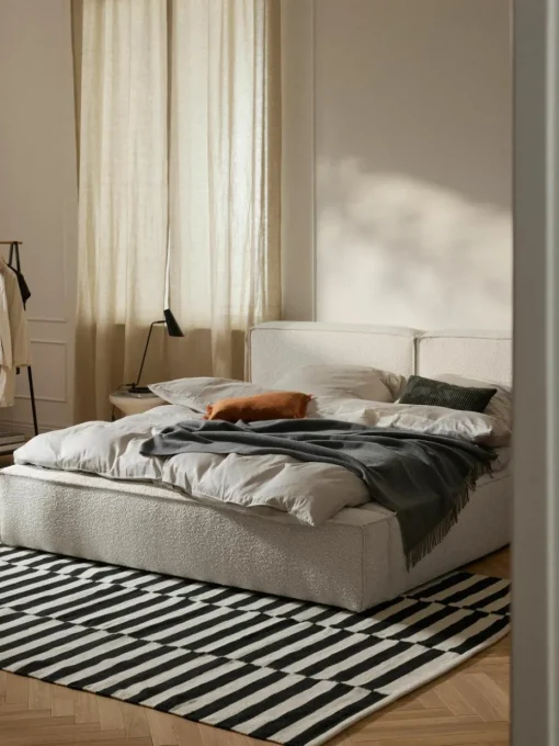 Bouclé gestoffeerd bed Lennon met opbergruimte