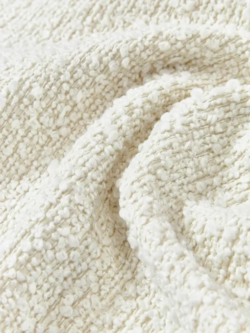 Bouclé kussenhoes Bellamie