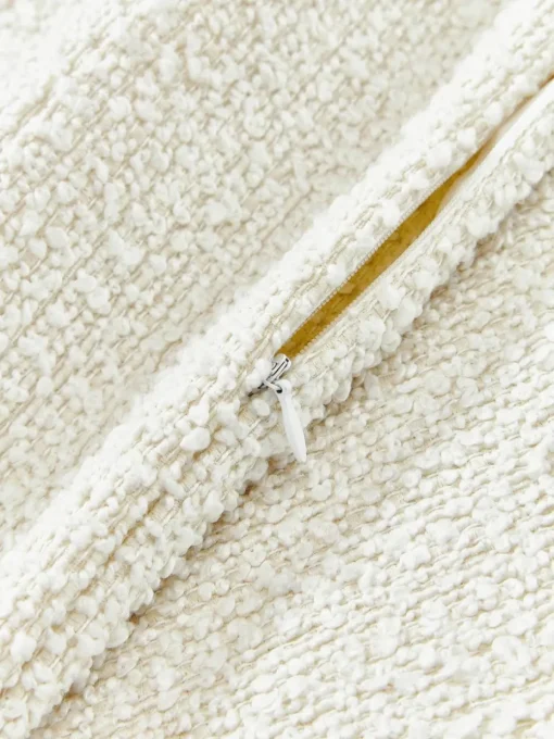 Bouclé kussenhoes Bellamie