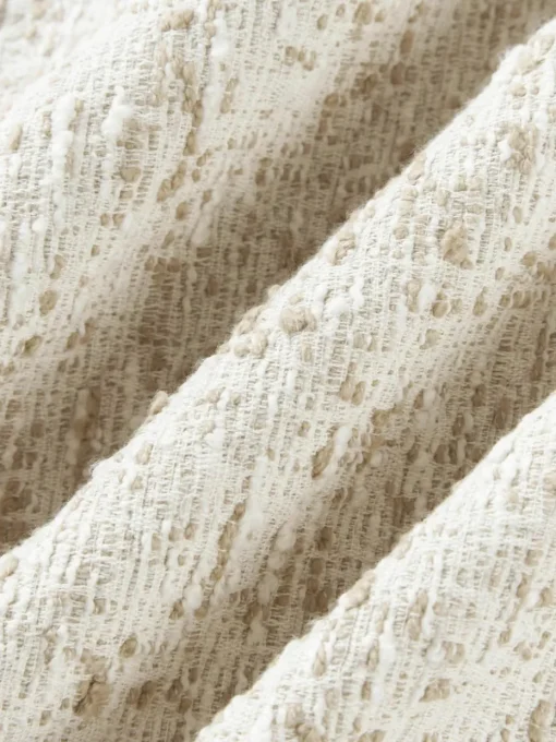 Bouclé kussenhoes Talea
