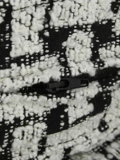 Bouclé loungefauteuil Stories