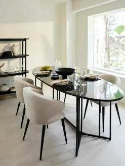 Fluwelen armstoel Celia in modern design