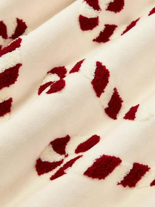 Fluwelen kussenhoes Darva met getuft snoepstokken-patroon