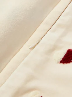 Fluwelen kussenhoes Darva met getuft snoepstokken-patroon