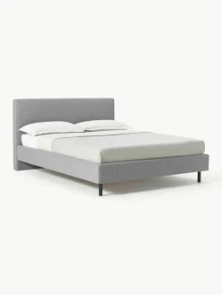 Gestoffeerd bed Giulia met houten poten