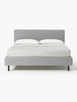 Gestoffeerd bed Giulia met houten poten