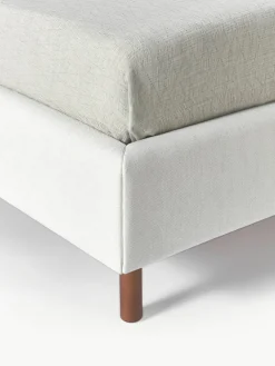 Gestoffeerd bed Giulia met houten poten