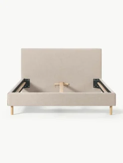 Gestoffeerd bed Giulia met houten poten