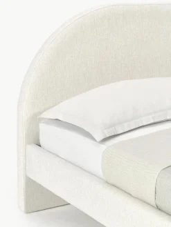 Gestoffeerd bed Rena met bolvormige poten van eikenhout