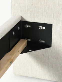 Gestoffeerd bed Rena met bolvormige poten van eikenhout