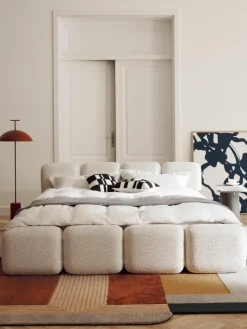 Gestoffeerd bed Tayla van teddy bouclé met opbergruimte