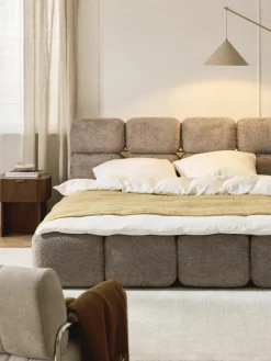 Gestoffeerd bed Tayla van teddy bouclé met opbergruimte
