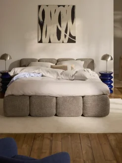 Gestoffeerd bed Tayla van teddy bouclé met opbergruimte