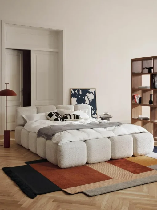 Gestoffeerd bed Tayla van teddy bouclé met opbergruimte