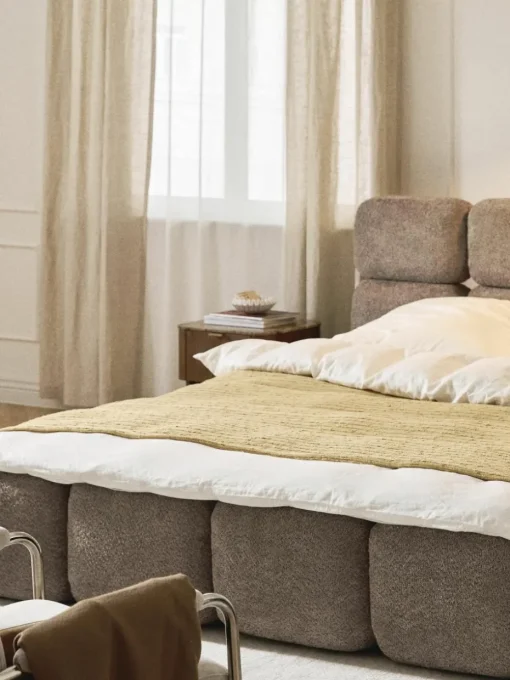 Gestoffeerd bed Tayla van teddy bouclé met opbergruimte
