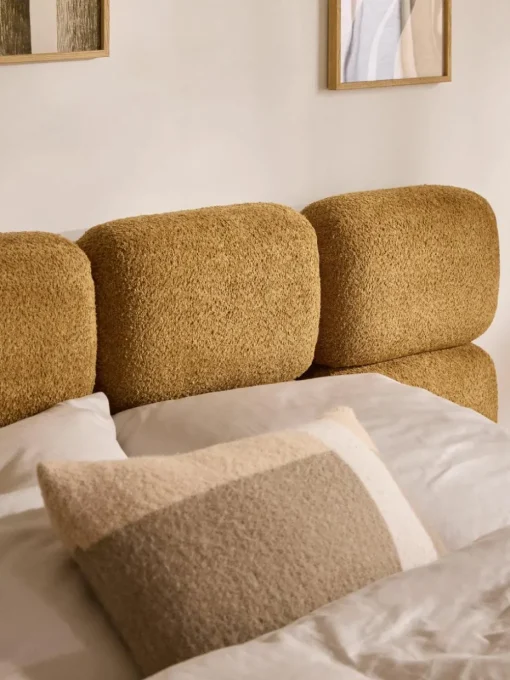 Gestoffeerd bed Tayla van teddy bouclé met opbergruimte