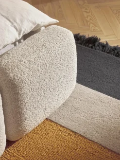 Gestoffeerd bed Tayla van teddy bouclé met opbergruimte