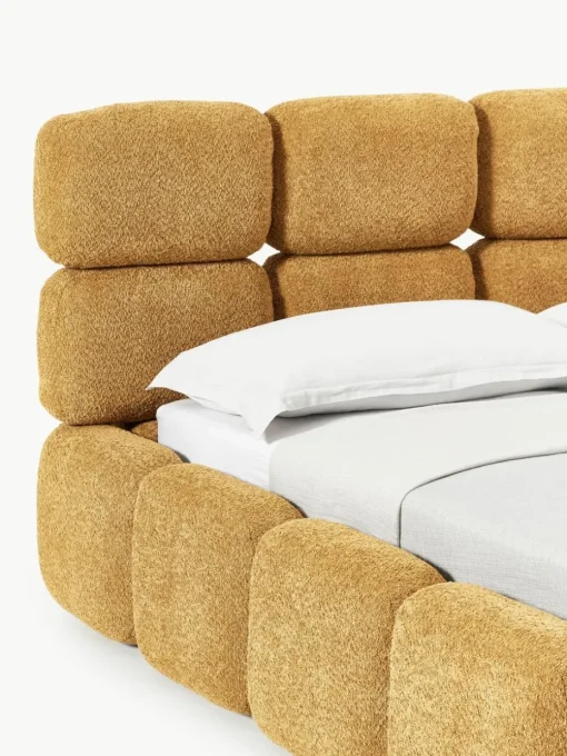 Gestoffeerd bed Tayla van teddy bouclé met opbergruimte