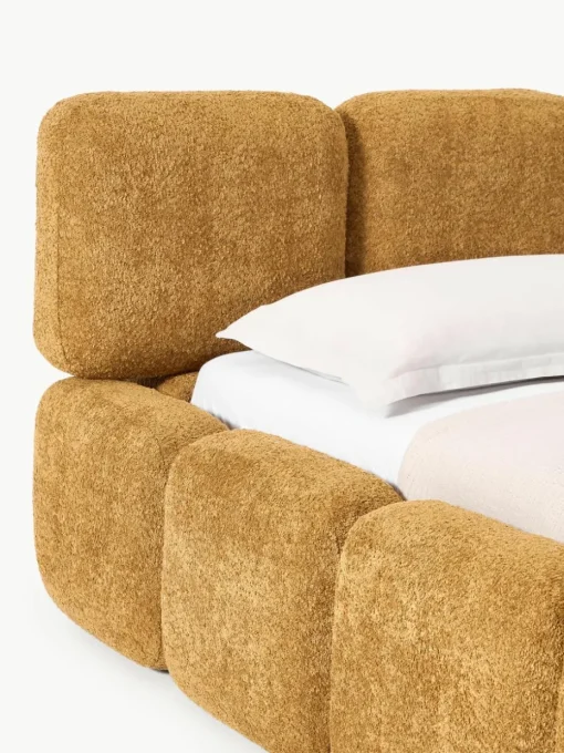 Gestoffeerd bed Tayla van teddy bouclé met opbergruimte