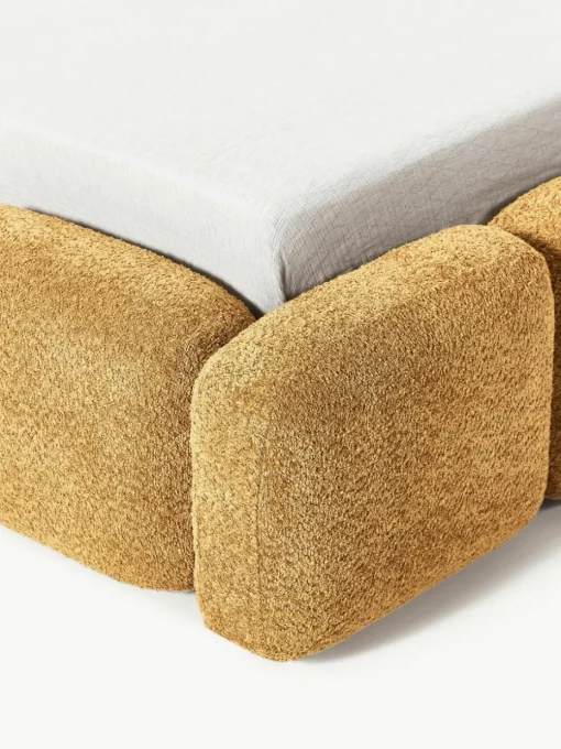 Gestoffeerd bed Tayla van teddy bouclé met opbergruimte