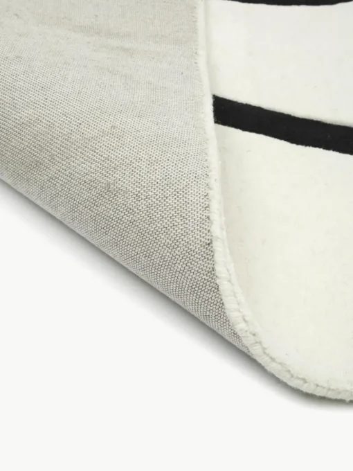 Handgetuft wollen vloerkleed Line met One Line tekening