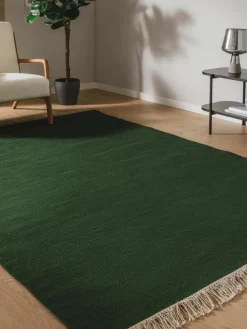 Handgeweven wollen vloerkleed Liv met franjes