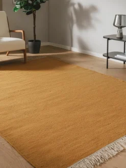 Handgeweven wollen vloerkleed Liv met franjes