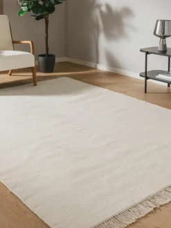 Handgeweven wollen vloerkleed Liv met franjes