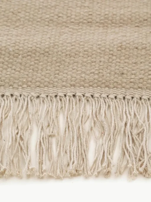 Handgeweven wollen vloerkleed Liv met franjes
