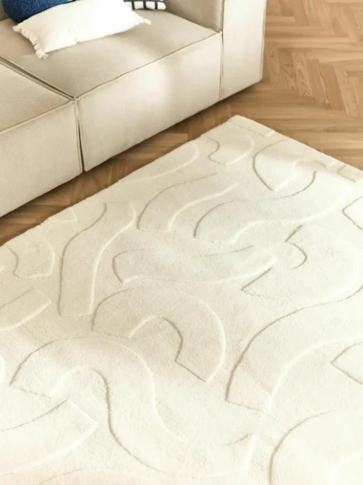 Handgeweven wollen vloerkleed Clio met hoog-laag structuur