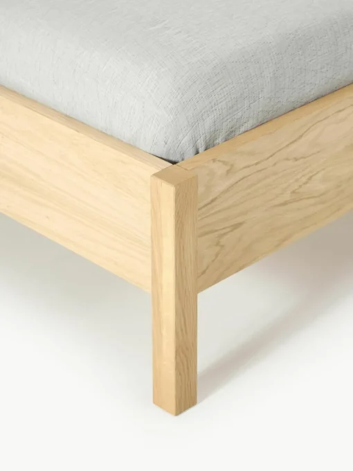 Houten bed Jones met hoofdeinde van bouclé