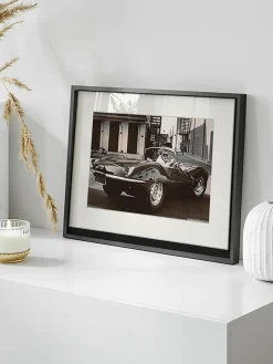 Ingelijste print Steve McQueen in zijn Jaguar
