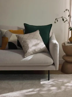 Katoenen kussenhoes Nomi met abstracte decoratie