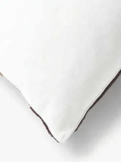 Katoenen kussenhoes Nomi met abstracte decoratie