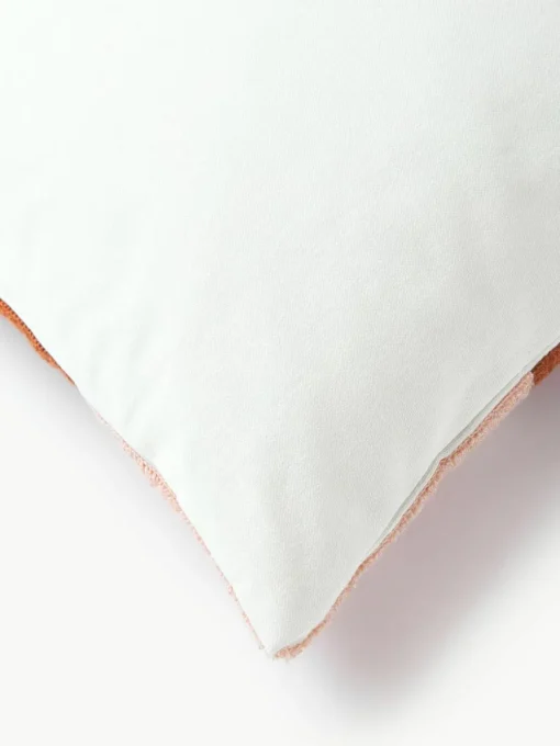 Katoenen kussenhoes Nomi met abstracte decoratie
