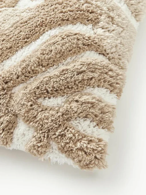 Katoenen kussenhoes Sela met getuft plantenmotief