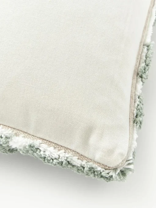 Katoenen kussenhoes Sela met getuft plantenmotief