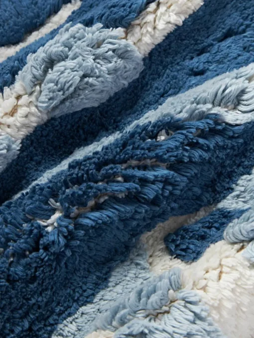 Katoenen kussenhoes Sela met getuft plantenmotief
