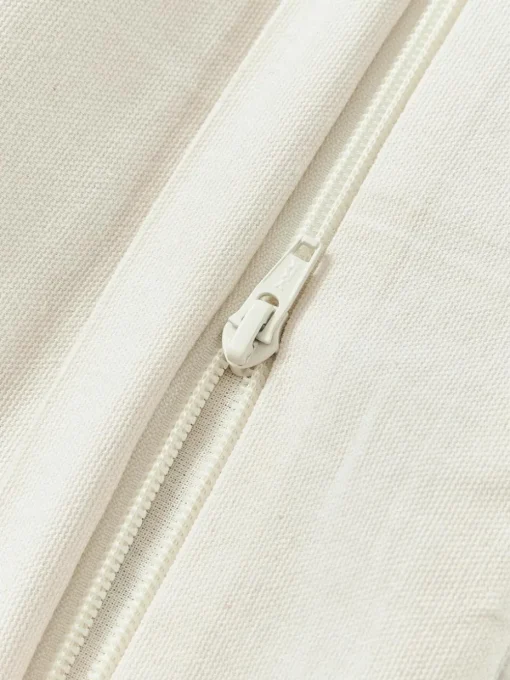 Katoenen kussenhoes Sela met getuft plantenmotief
