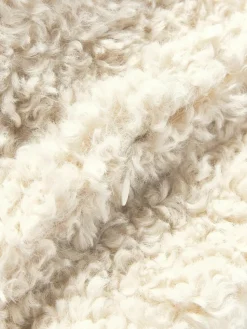 Lang decoratief kussen Dotty van teddy stof