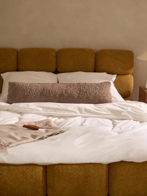 Lang decoratief kussen Dotty van teddy stof