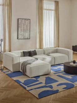 Modulaire bank Lennon (4-zits) uit bouclé met poef (links/rechts)