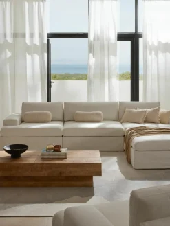 Modulaire bank Russell (4-zits) met poef (links/rechts)