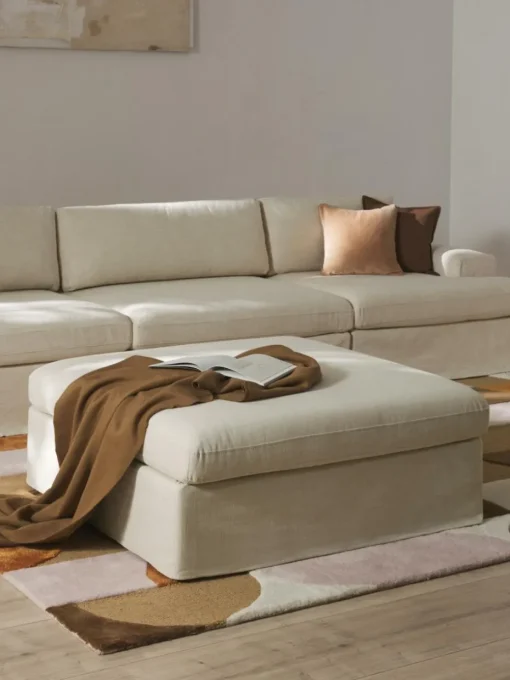 Modulaire bank Russell (4-zits) met poef, met afneembaar hoezen