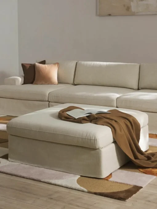 Modulaire bank Russell (4-zits) met poef, met afneembaar hoezen