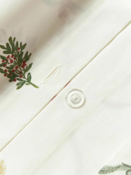 Omkeerbaar katoenen perkal dekbedovertrek Twigs met winterse prints