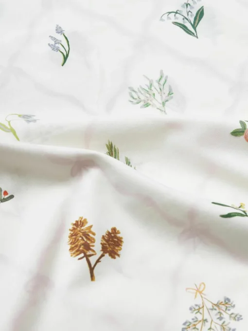 Omkeerbaar katoenen perkal dekbedovertrek Twigs met winterse prints